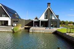 Ferienhaus - Luxe villa aan het water - Ferienhaus in Stavoren (8 Personen)