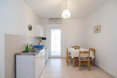 Ferienwohnung - Apartments Boguvila - Two-Bedroom Basic Apartment with Terrace (A1) - (ST) - Ferienunterkunft in Supetar (5 Personen)
