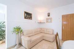 Ferienwohnung - Apartment Vrandecic - Two Bedroom Apartment with Garden Terrace (Žarka) (ST) - Ferienunterkunft in Postira (4 Personen)