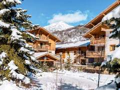 Ferienwohnung - Ferienwohnung Le Hameau du Rocher Blanc