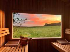 Ferienwohnung - Ferienwohnung Maritime, moderne Ferienwohnung mit Gartensauna