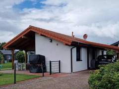 Ferienhaus - Ferienhaus M1 Ferienhaus mit Garten, Terrasse und Carport