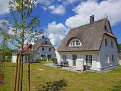 Ferienhaus - Ferienhaus Reet-Hus Hanbutt in Glowe