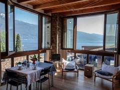 Ferienwohnung - Ferienwohnung Kumquat Studio mit Garten- und Seeblick