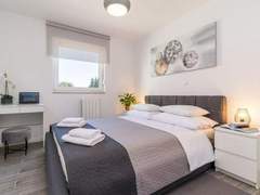 Ferienwohnung - Ferienwohnung Wohnung mit Blick auf das Wasser