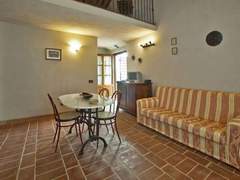 Ferienwohnung - Ferienwohnung Wohnung in Asciano mit Grill und Garten