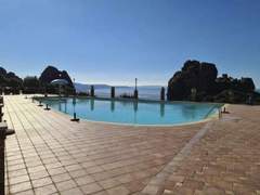 Ferienhaus - Ferienhaus Haus 'Red Coral' mit Gemeinschaftspool