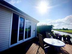 Ferienhaus - Ferienhaus Ela mit Holzgrill, Garten und Terrasse