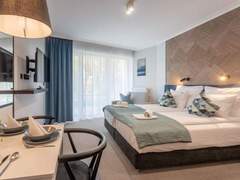 Ferienwohnung - Ferienwohnung Elegantes, strandnahes Ferienappartement Albus