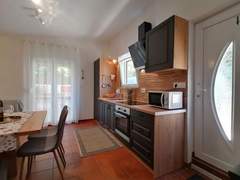 Ferienhaus - Ferienhaus Strandnahes kleines Ferienhaus mit Terrasse