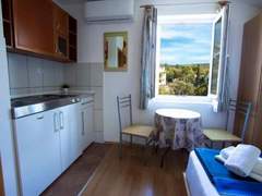 Ferienwohnung - Ferienwohnung Buka Calm VIIi