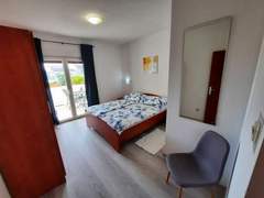 Ferienwohnung - Ferienwohnung Gemütliche Erdgeschossferienwohnung mit Balkon