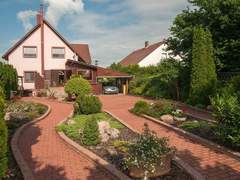 Ferienhaus - Ferienhaus Wohnung mit Garten, Grill und Gemeinschaftspool