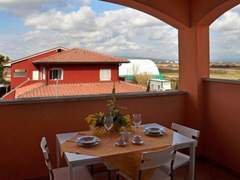 Ferienwohnung - Ferienwohnung Geräumige Alloggion mit eigener Terrasse, AC