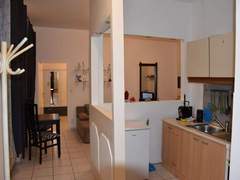 Ferienwohnung - Ferienwohnung Charmante Wohnung in Fünfhaus mit Garten