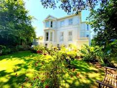 Ferienwohnung - Ferienwohnung Helle Wohnung in Torquay mit Garten