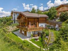 Ferienhaus - Ferienhaus Chalet Le Papillon, sauna, 4 Vallées