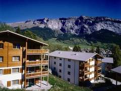 Ferienwohnung - Ferienwohnung Hapimag Resort Flims, (Flims Waldhaus). Apartment mit Blick auf die Bergen