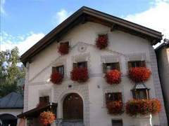 Ferienwohnung - Ferienwohnung Dachwohnung Plazzetta 23, (Sent).