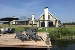 Ferienhaus - Resort Waterrijk Oesterdam 14 - Ferienunterkunft in Tholen (10 Personen)