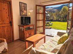 Ferienwohnung - Ferienwohnung Bajo con jardín y parking - Dellui 2