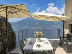 Ferienwohnung - Ferienwohnung Riflesso del Lario