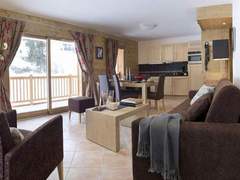 Ferienwohnung - Ferienwohnung CGH Rés & Spa Chalets du Flambeau 4*