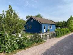 Ferienhaus - Ferienhaus mit Garten, Grill und Terrasse