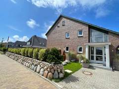 Ferienwohnung - Ferienwohnung Wohnung in Westerland mit Garten und Terrasse