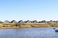 Ferienhaus - MERKUR 35+33 S DHH 1.RH. - Ferienunterkunft in Wendtorf (4 Personen)