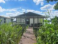 Ferienhaus - Ferienhaus Bootshaus auf dem See