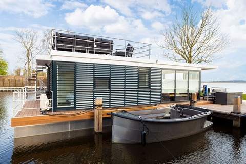 Houseboat 'de Valreep' met tuin - Paviljoenwei 2 - Boot in Offingawier (4 Personen)