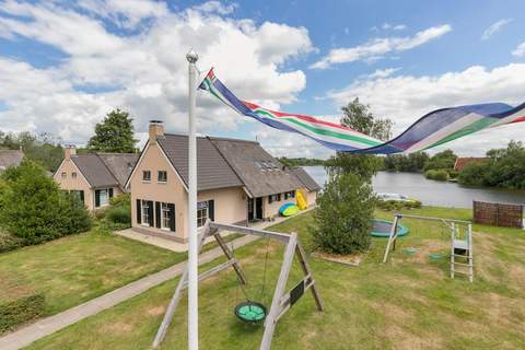 12 pers Lethehuis met sauna buitenspa en toerboot - Ferienunterkunft in Groningen (12 Personen)