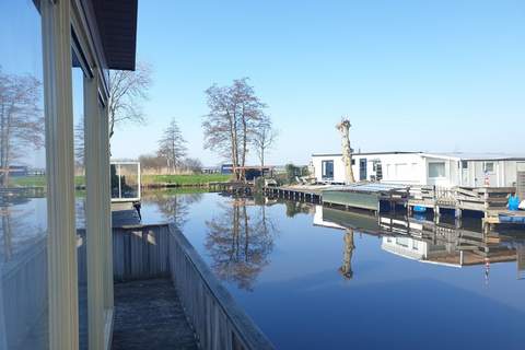 Luxe chalet 55 aan het water in Bantega met sloep 8 pax - Ferienunterkunft in Bantega (8 Personen)