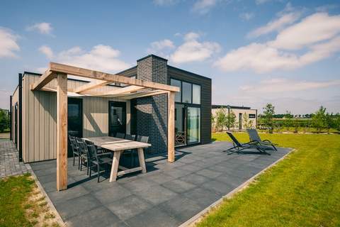 Vakantiepark Zeedijk 2 - Ferienunterkunft in Herkingen (4 Personen)