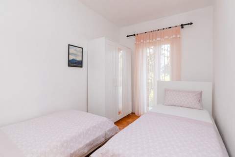 Apartments Martić - Four Bedroom Apartment with Terrace and Sea View - (ST) - Ferienunterkunft in Supetar (8 Personen)