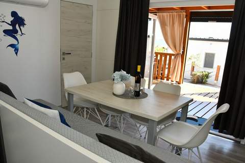Mobile Home With Terrace And Sea View (Azzuro) - Ferienunterkunft in Drage (6 Personen)