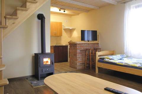 Murowany domek wakacyjny dla 5 osób w Rynie - Ferienunterkunft in Ryn (5 Personen)