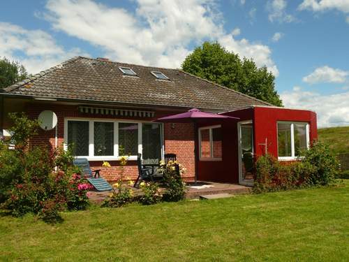 Ferienhaus Gemütliches Ferienhaus am Deich mit Gartenzimmer