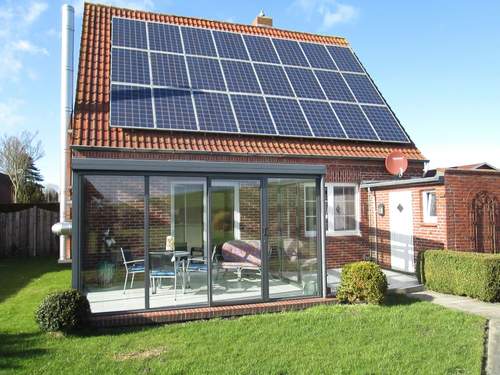 Ferienhaus mit Wintergarten und Garten am Deich