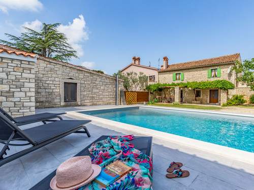 Ferienhaus Courtyard Ivini