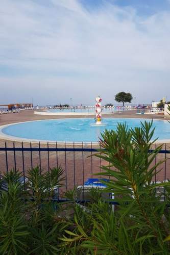 Ferienwohnung Wohnung Hama Komunela mit Garten und Stellplatz