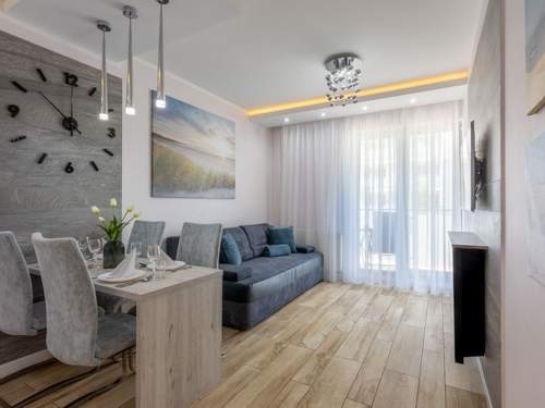 Ferienwohnung Ostsee-Ferienwohnung Bianco 8 mit Kamin