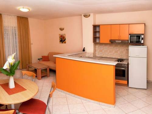 Ferienwohnung Modern eingerichtete Ferienwohnung orange