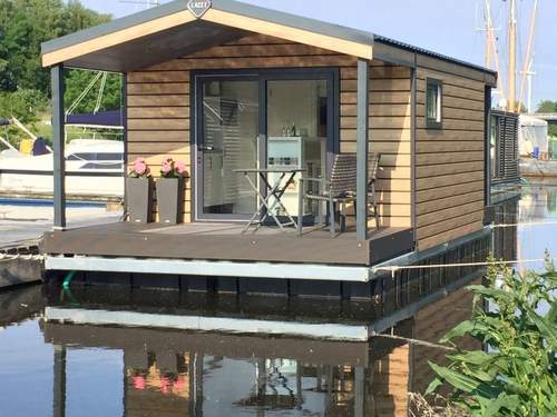 Ferienwohnung Hausboot KHT 1 Lacet mit Elektrokamin im Salon, 1 Schlafraum, Küche, Duschbad m