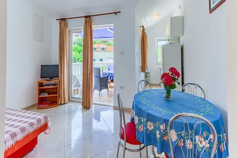 Apartments Ivo - One bedroom apartment with terrace and sea view (A5) - Ferienunterkunft in Postira (2 Personen)