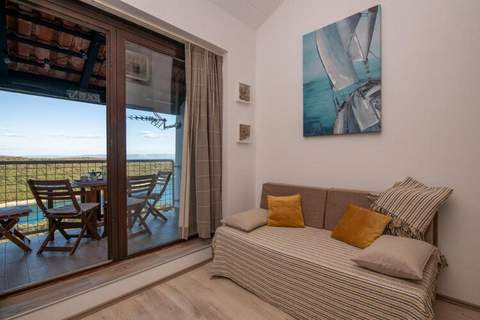 Apartment Baselak - Duplex One Bedroom Apartment with Balcony and Sea View - Ferienunterkunft in Krnica (4 Personen)