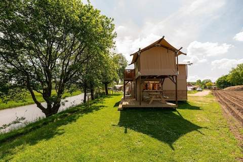Treehouse tent at the Regge with private sanitary facilities | 6 people - Ferienunterkunft in Zuna (6 Personen)