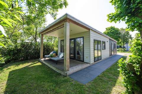 River Lodge 'Wellnesshuus' with whirlpool, sauna, bathtub, and sun shower | 2 people - Ferienunterkunft in Zuna (2 Personen)