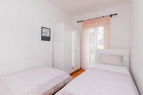 Apartments Martić - Four Bedroom Apartment with Terrace and Sea View - (ST) - Ferienunterkunft in Supetar (8 Personen)